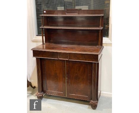 A William IV mahogany chiffonier in the manner of Gillows, the two beaded edge pillar shelf with panelled back over two friez