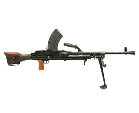A DEACTIVATED WORLD WAR TWO INGLIS .303 'BREN MKII' LIGHT MACHINE GUN WITH TRANSIT CHEST, serial no. 7T.5082, , the gun dated