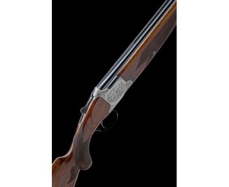 FABRIQUE NATIONALE A 12-BORE 'CUSTOM B25' SINGLE-TRIGGER OVER AND UNDER EJECTOR, serial no. 89101 S8, dated 1968, 28in. nitro