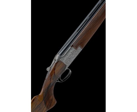 FABRIQUE NATIONALE A BROWN-ENGRAVED 12-BORE CUSTOM 'B25' SINGLE-TRIGGER OVER AND UNDER EJECTOR, serial no. 12050 S72, for 197