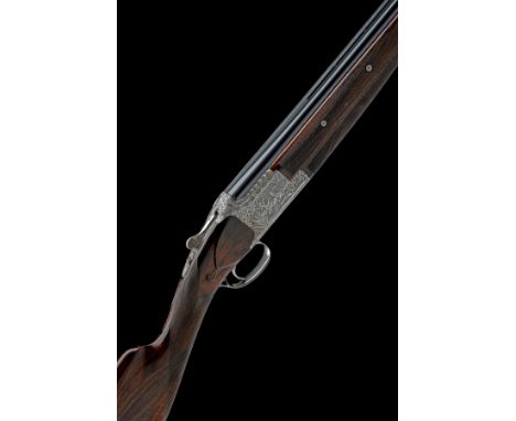 FABRIQUE NATIONALE A CUISSET AND ACAMPO-ENGRAVED 12-BORE 'D4G' SINGLE-TRIGGER OVER AND UNDER EJECTOR, serial no. 21495 S73, f