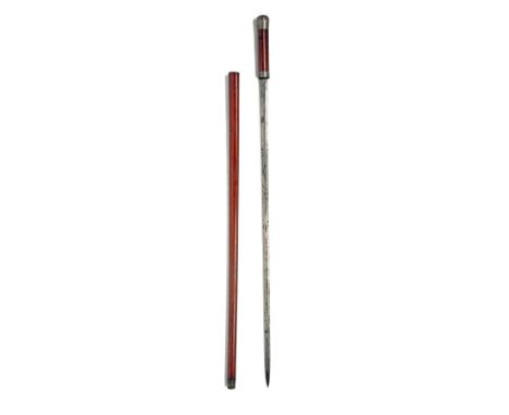 A VICTORIAN SWORD-STICK WITH WHITE-METAL MOUNTS, last quarter of the 19th century, with 30 1/2in. blade with blind central fu