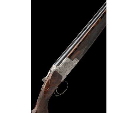 BROWNING ARMS COMPANY A BRIGANTE-ENGRAVED 12-BORE 'D4G' SINGLE-TRIGGER OVER AND UNDER EJECTOR, serial no. 325NV02447, for 199