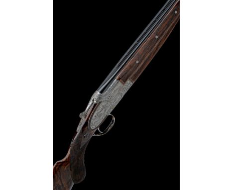 FABRIQUE NATIONALE A RARE CUSTOM BAPTISTE-ENGRAVED .410 'B25' SINGLE-TRIGGER SIDEPLATED OVER AND UNDER EJECTOR, serial no. IJ
