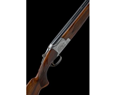 FABRIQUE NATIONALE A DEVEUX & BEE ENGRAVED 12-BORE 'B2G' SINGLE-TRIGGER OVER AND UNDER EJECTOR, serial no. 8H3RN07948, for 19