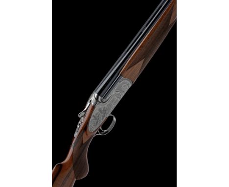 CAESAR GUERINI A 12-BORE 'MAGNUS' SINGLE-TRIGGER SIDEPLATED OVER AND UNDER EJECTOR, serial no. 137447, dated 2014, 30in. nitr