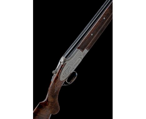 FABRIQUE NATIONALE A CUSTOM BAPTISTE-ENGRAVED 12-BORE 'B25' SINGLE-TRIGGER SIDEPLATED OVER AND UNDER EJECTOR, serial no. 1858