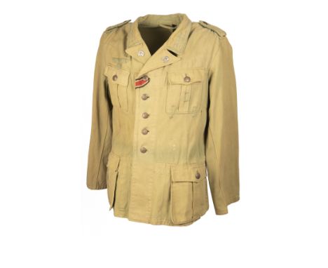 A RARE WORLD WAR TWO GERMAN ARMY NCO's TROPICAL TUNIC, possibly Afrika Korps or Italian campaign, of four pleated pocket desi