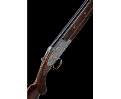FABRIQUE NATIONALE A CAPECE-ENGRAVED 12-BORE 'CUSTOM' SINGLE-TRIGGER SIDEPLATED OVER AND UNDER EJECTOR, serial no. 57183 S8, 