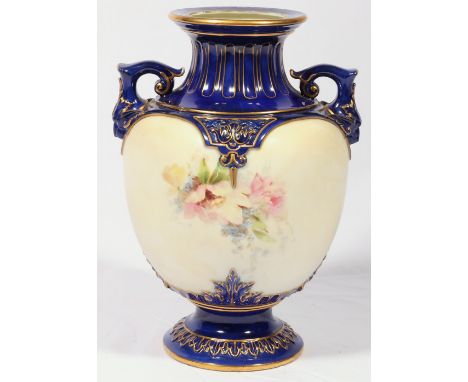 Royal Worcester twin handled vase decorated with flowers, 21cm