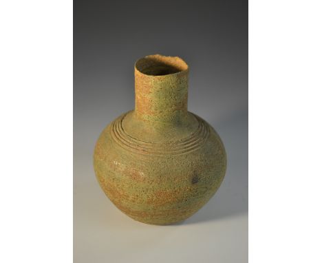 A David Leach Studio Pottery eathernware ovoid bottle vase, ribbed shoulder, in mottled brown and green tones, 14cm high, imp