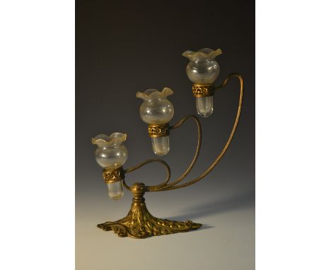 An Art Nouveau gilt metal three branch epergne, by Osler, the base cast with stiff acanthus leaves and scrolls, each sinuous 