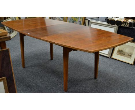 Gordon Russell Limited, Broadway, Worcester  - a teak and Indian laurel slightly bowed rectangular extending dining table, ca