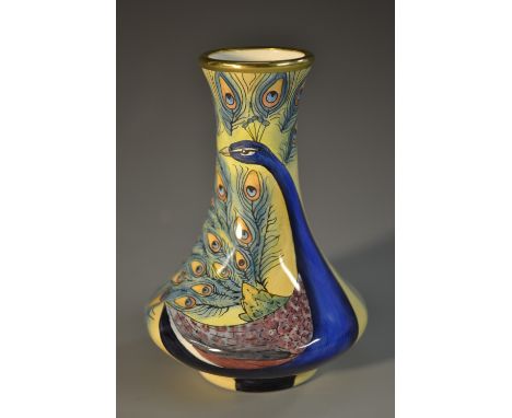 A Moorcroft Peacock pattern enamel vase, designed by Rachel Bishop, 8.5cm high, boxed