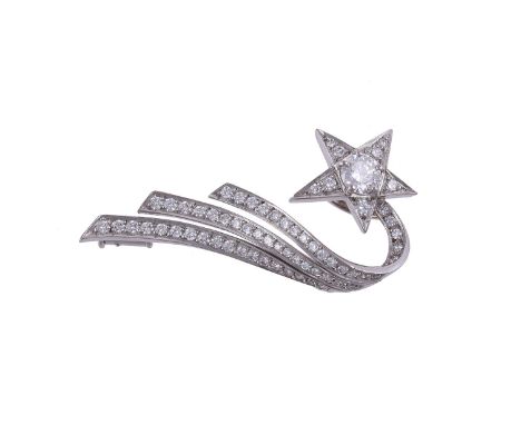 CHANEL, COMÈTE DIAMOND BROOCH/PENDANTthe star panel with curved diamond set tail, approximately 0.85 carats total, signed Cha