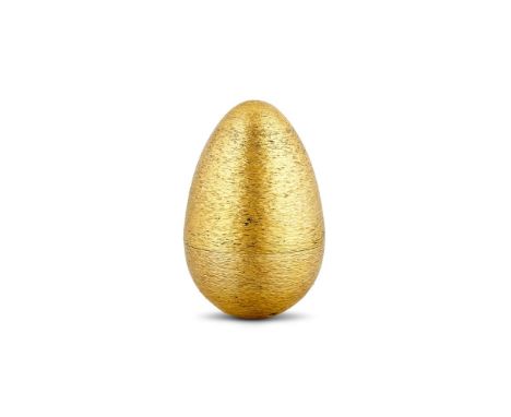 A CASED SILVER GILT SURPRISE EGG BY STUART DEVLINLONDON 1981, NO. 93The textured cover opening to gilt and enamel Prince of W