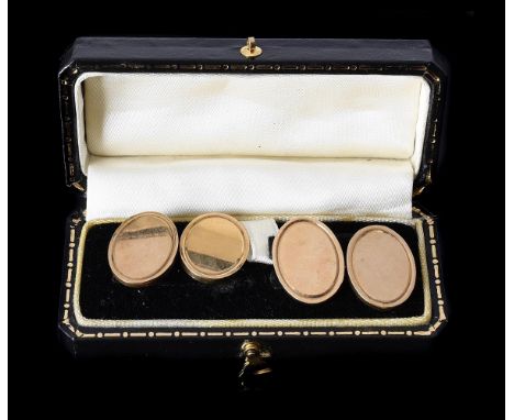 DEAKIN & FRANCIS, A PAIR OF 9 CARAT GOLD CUFFLINKSthe polished oval panels with belcher link connectors, Birmingham 1992 hall
