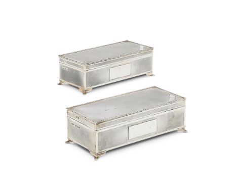 A MATCHED PAIR OF SILVER RECTANGULAR CIGARETTE BOXES BY HARMAN BROTHERS BIRMINGHAM 1982 AND 1990 With engine turned decoratio