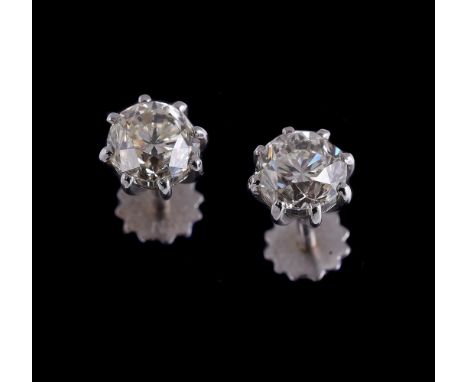 A PAIR OF DIAMOND EAR STUDSthe brilliant cut diamonds in eight claw settings, approximately 1.50 carats total, with screw stu