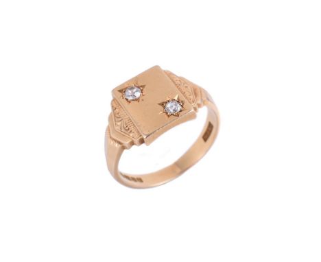 A 1960S DIAMOND SIGNET RINGthe rectangular panel with two star set old mine cut diamonds, to stepped arrow shaped shoulders, 
