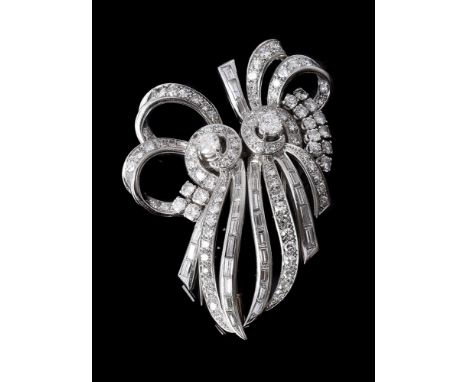 A 1950S FRENCH DIAMOND DOUBLE CLIP BROOCHthe stylised bow shaped clips set with brilliant cut, eight cut and baguette cut dia