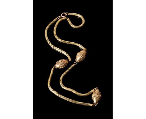 A VICTORIAN GOLD NECKLACEthe serpent link chain with three ovoid bead spacers with applied ropetwist and beaded decoration, l