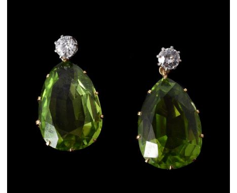 A PAIR OF PERIDOT AND DIAMOND EAR PENDANTS the old brilliant cut diamonds in claw settings, approximately 0.50 carats total, 