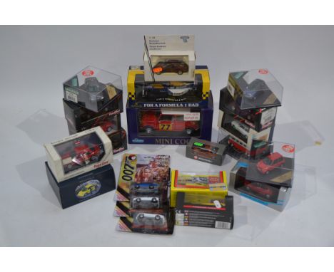 Modern Diecast Vehicles, a boxed/carded collection of modern mainly private vehicles including a 1:16 scale rally Mini Cooper