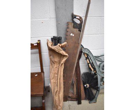 A selection of tools including chimney brushes etc