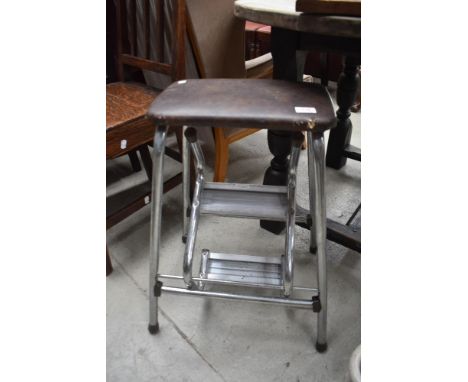 A vintage folding step stool