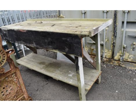 A vintage pine work bench or potting table