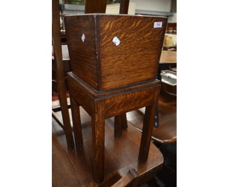 A mid 20th Century oak planter