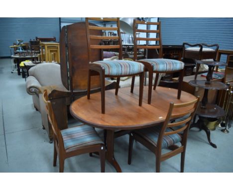 A G plan oval dining table and four ladder back chairs