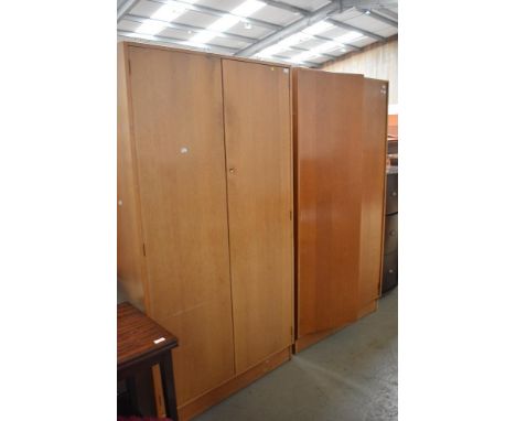 Two vintage golden oak wardrobes