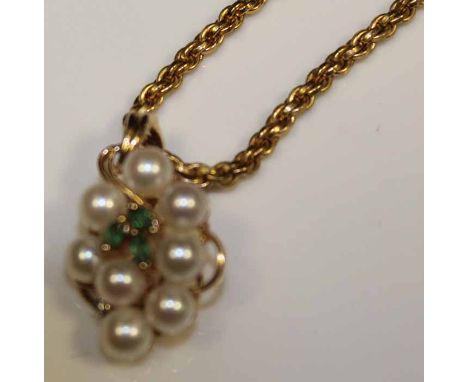 NINE CARAT GOLD PEARL AND GEM SET PENDANT
in the form of a grape vine with green gem and white gem; together gold plated chai