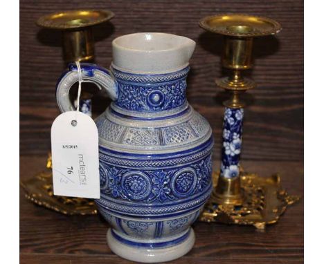 GERMAN POTTERY EWER AND A PAIR OF VICTORIAN BRASS AND CERAMIC CANDLESTCKS 