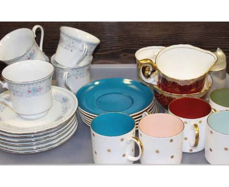 SUSIE COOPER PASTEL COFFEE CANS
five cans and saucers with pastel grounds and gilt star design; together with five Crown Ming