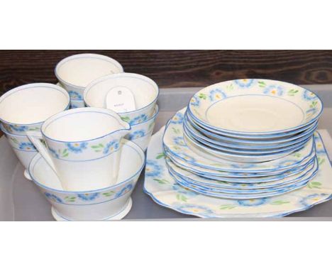 PHOENIX CHINA ART DECO STYLE TEA SET
with triangular handles and blue floral borders, six cups, saucers, plates, cream, sugar