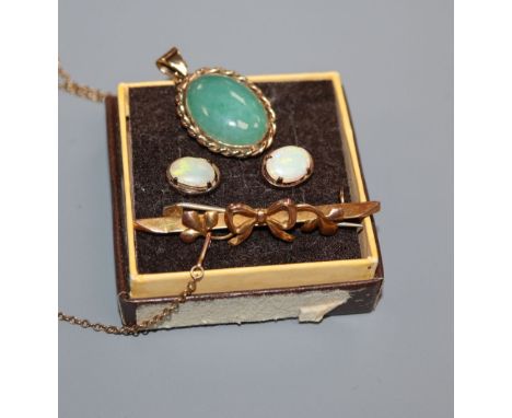 A yellow metal and jade pendant on 9ct chain, a 9ct brooch and a pair of 9ct and white opal earstuds.