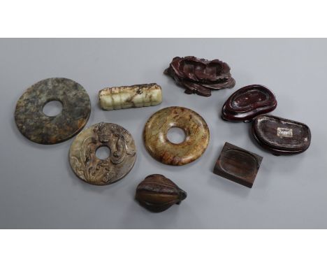 A Chinese jade 'chilong' bi disc, two hardstone bi discs and two other carvings