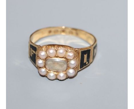 A Victorian 18ct gold, black enamel, plaited hair and split pearl set mourning ring, with inscription, 'A-M 26th May, 1858', 