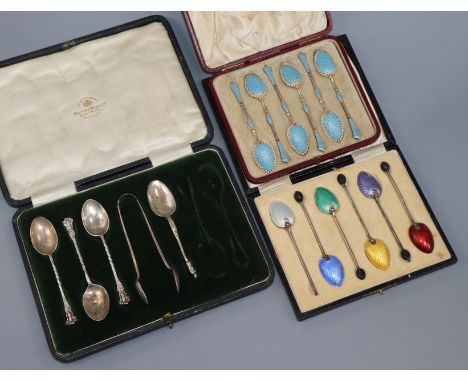 A saced set of six Norwegian white metal and enamel coffee spoons, one other silver set and an incomplete set.