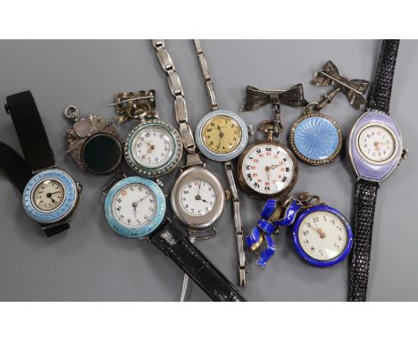 Nine assorted early 20th century white metal and enamel fob/wrist watches and a Victorian silver spinning fob.