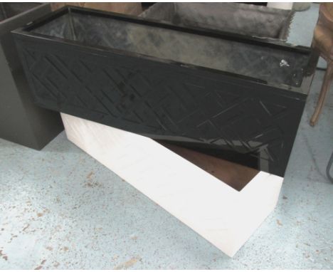 PLANTER, a near pair, one black and the other white, 101cm x 31cm x 31cm H. (2)