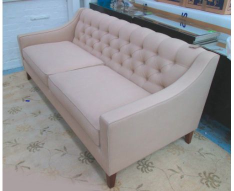 SOFA, two seater, in beige fabric, button back on square supports with two scatter cushions, 195cm L. 