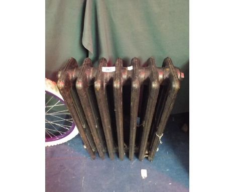 A Vintage Cast Iron Radiator, 38 Cm Wide.