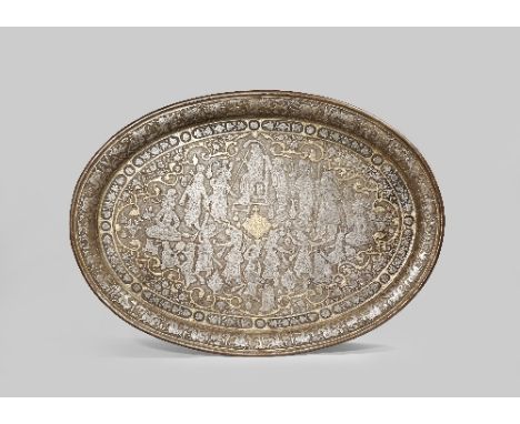A MIDDLE EASTERN GILT-DECORATED IRON DAMASCENED OVAL TRAY 19TH CENTURY Decorated with a scene of a feast within floral border