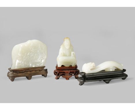 THREE CHINESE PALE CELADON JADE CARVINGS 19TH CENTURY One a small boulder carved with a monkey and a horse in a river landsca