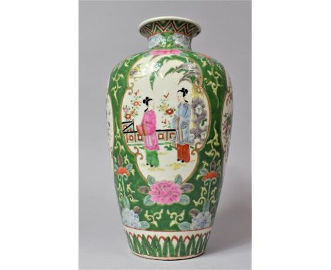 A Chinese Vase on Green Ground Decorated with Alternating   Cartouches in the Famille Rose Palette Depicting Figures and Anti