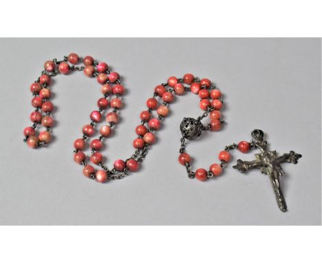 A String of Dyed Mother of Pearl Beads with Crucifix Pendant 
